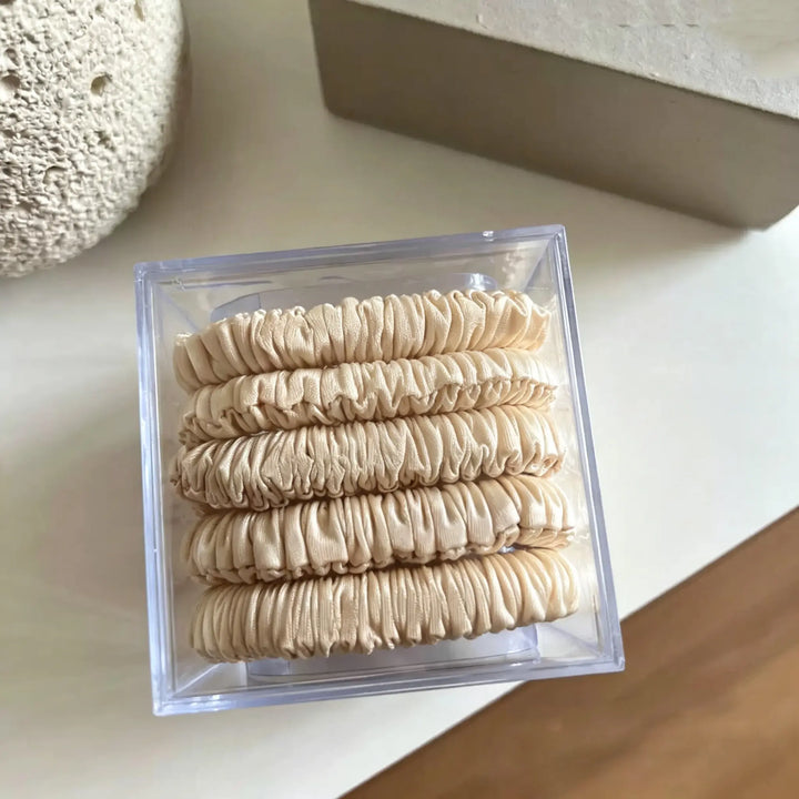 An image of a   Skinny Ruched Scrunchie Set by  Mirra Masa