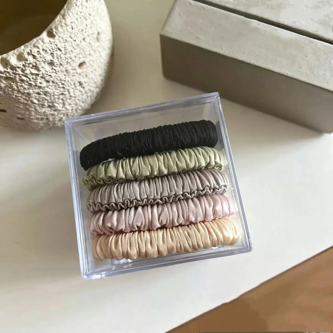 An image of a   Skinny Ruched Scrunchie Set by  Mirra Masa
