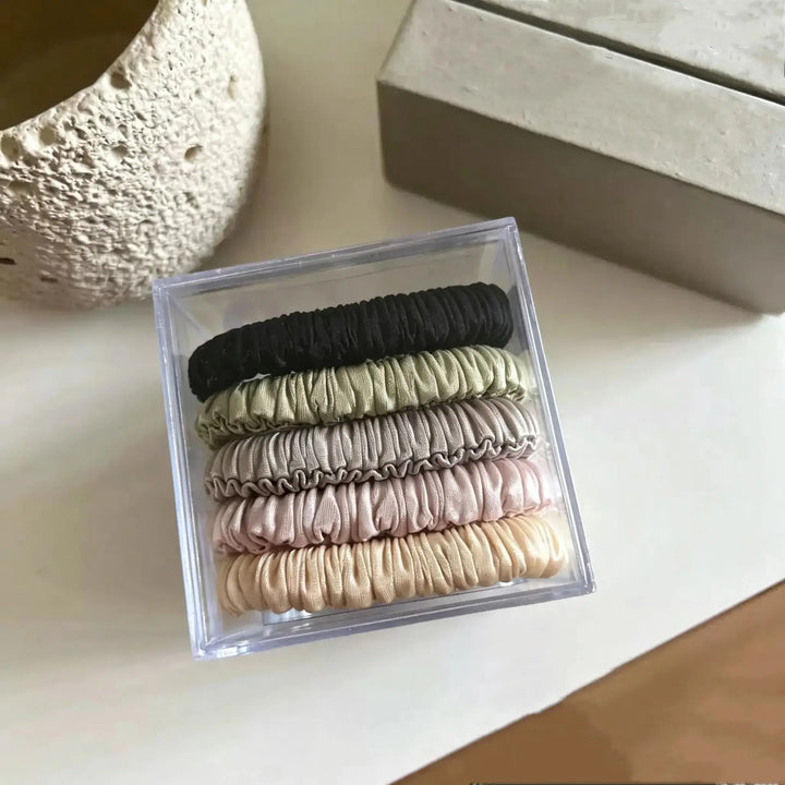 An image of a   Skinny Ruched Scrunchie Set by  Mirra Masa