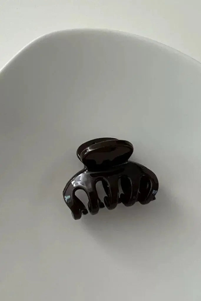An image of a   Slim Arch Hair Claw Small by  Mirra Masa