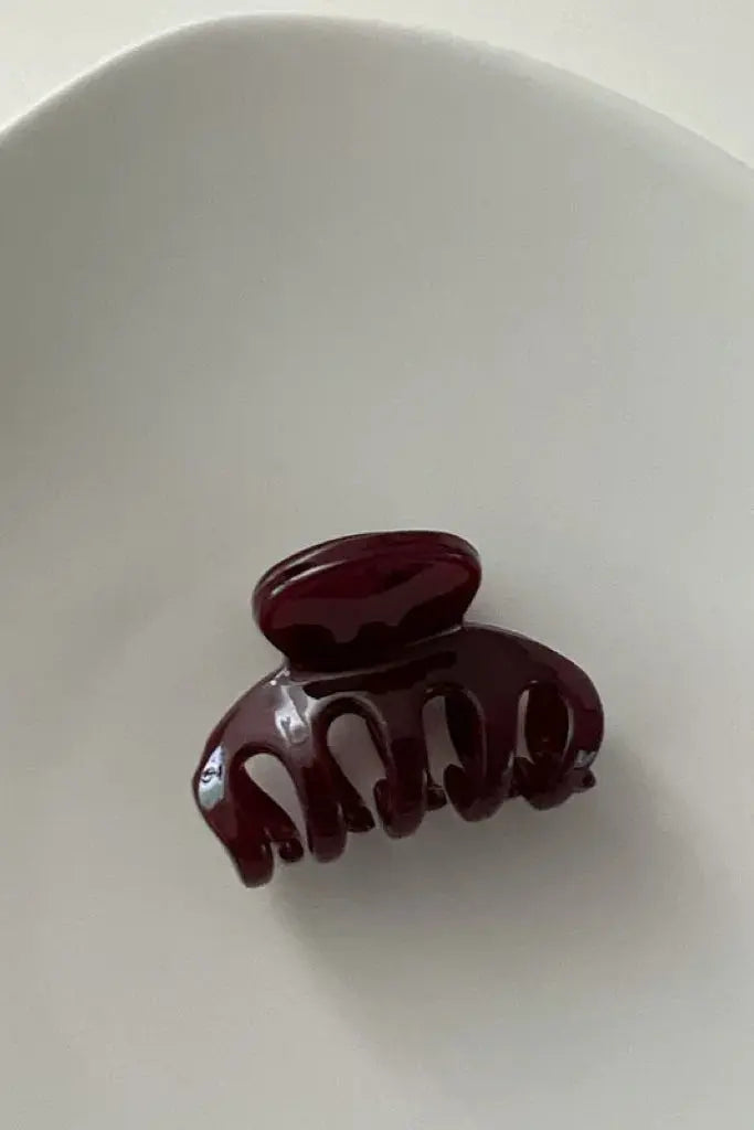 An image of a   Slim Arch Hair Claw Small by  Mirra Masa