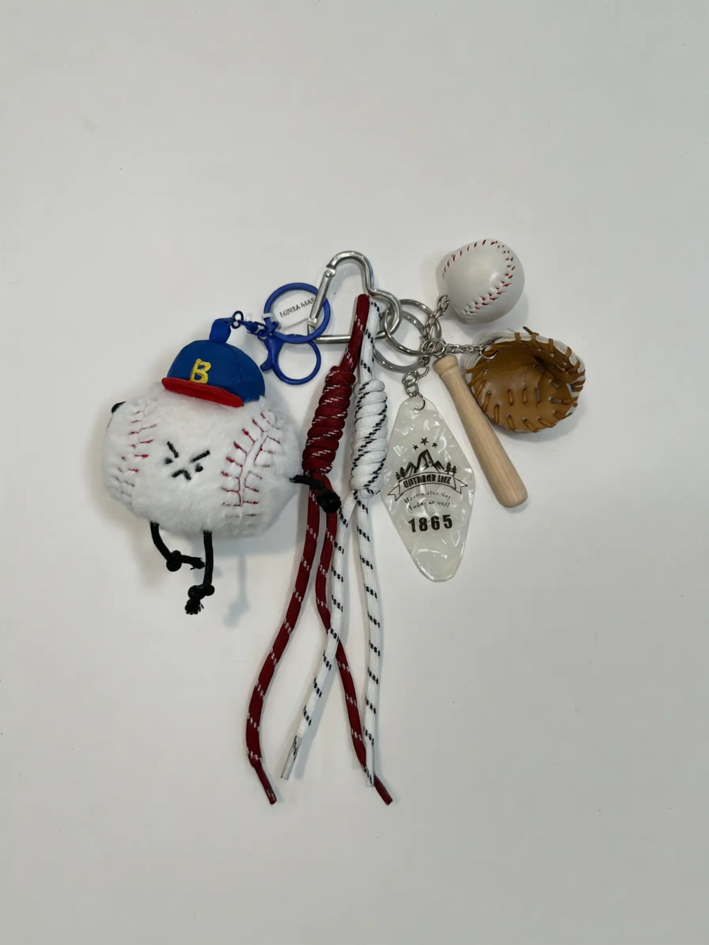 An image of a   Sporty Ball Buddy Bag&Key Charm by  Mirra Masa