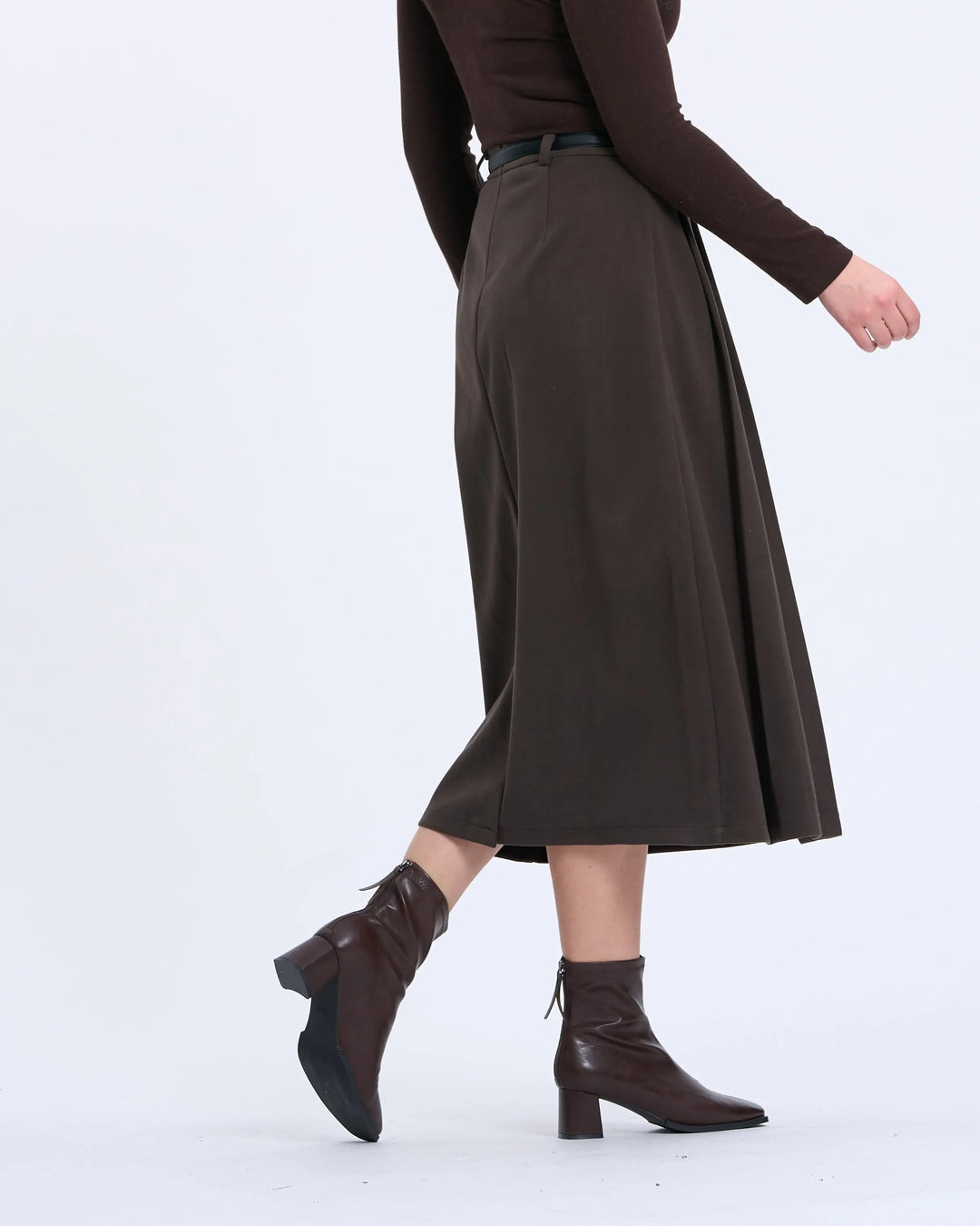 An image of a   T17 Side-Pleated Skirt by  Mirra Masa