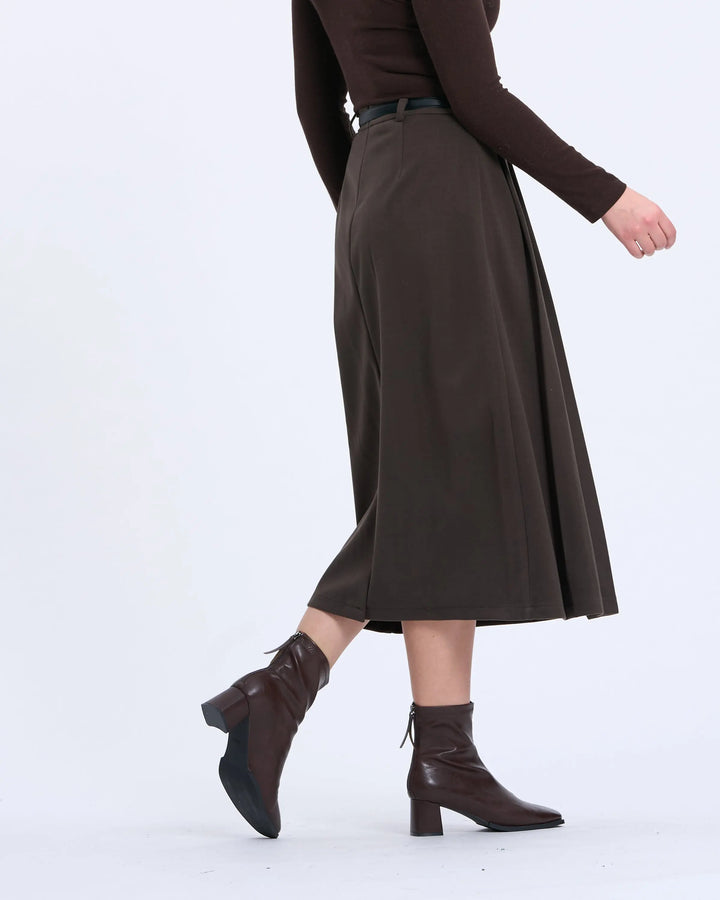 An image of a   T17 Side-Pleated Skirt by  Mirra Masa