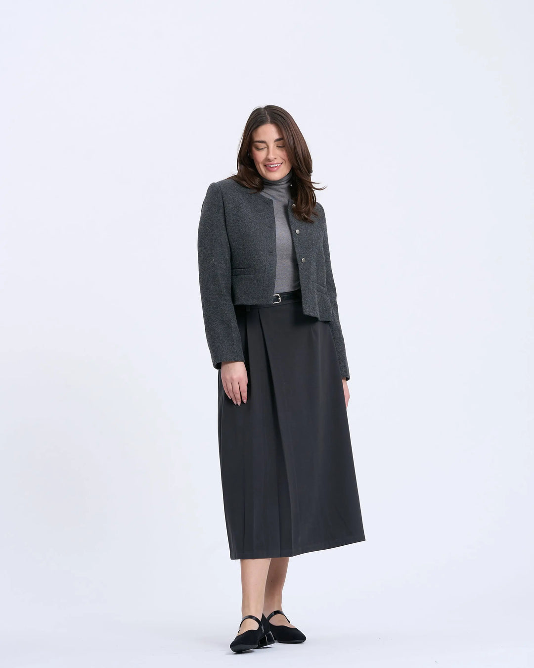 An image of a   T17 Side-Pleated Skirt by  Mirra Masa