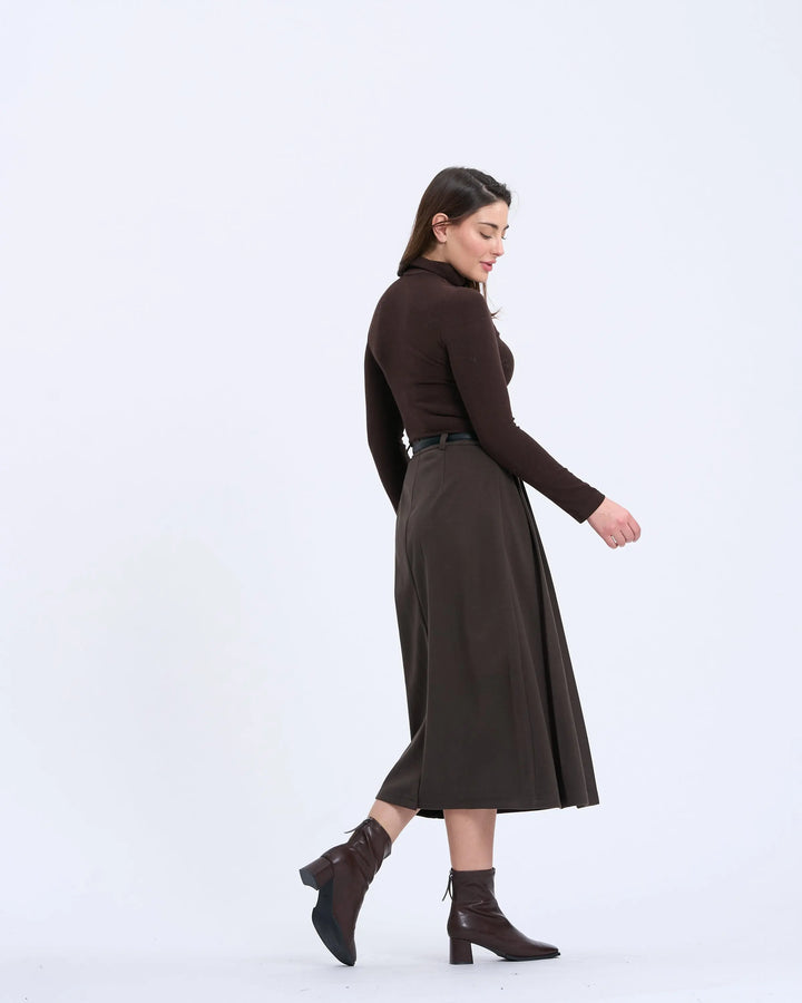An image of a   T17 Side-Pleated Skirt by  Mirra Masa