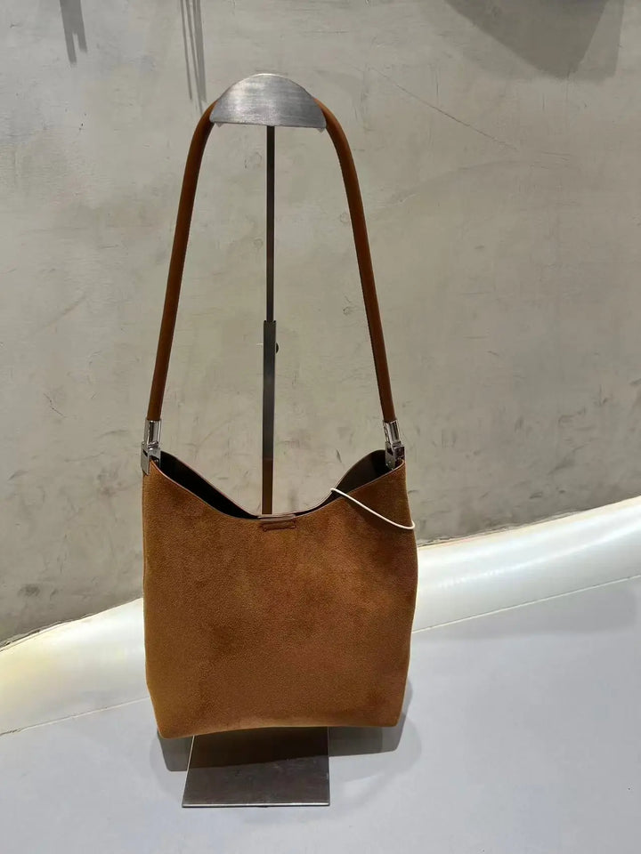 An image of a  Brown TF0077 Suede Shoulder Bag by  Mirra Masa