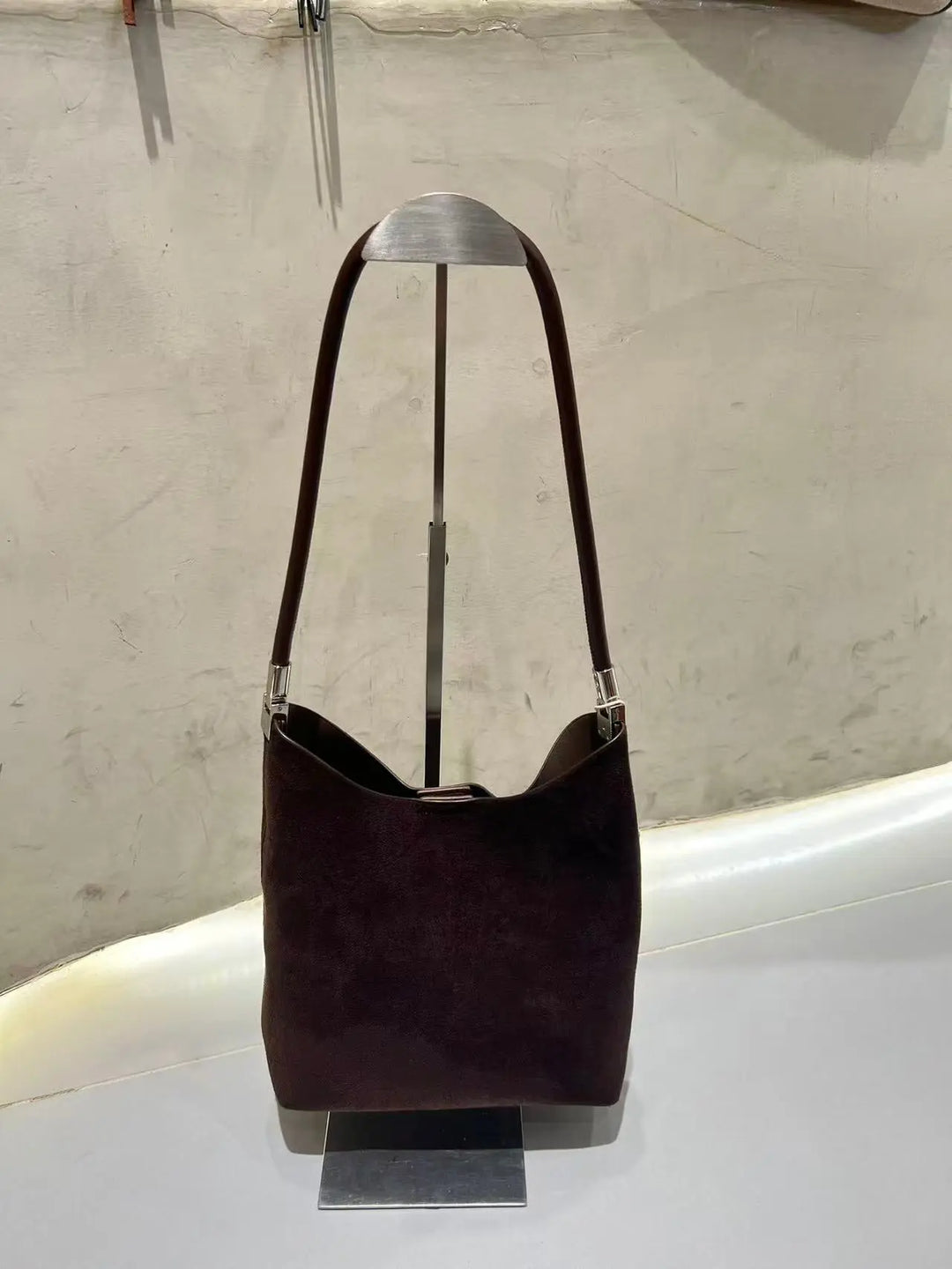 An image of a  Dark Brown TF0077 Suede Shoulder Bag by  Mirra Masa