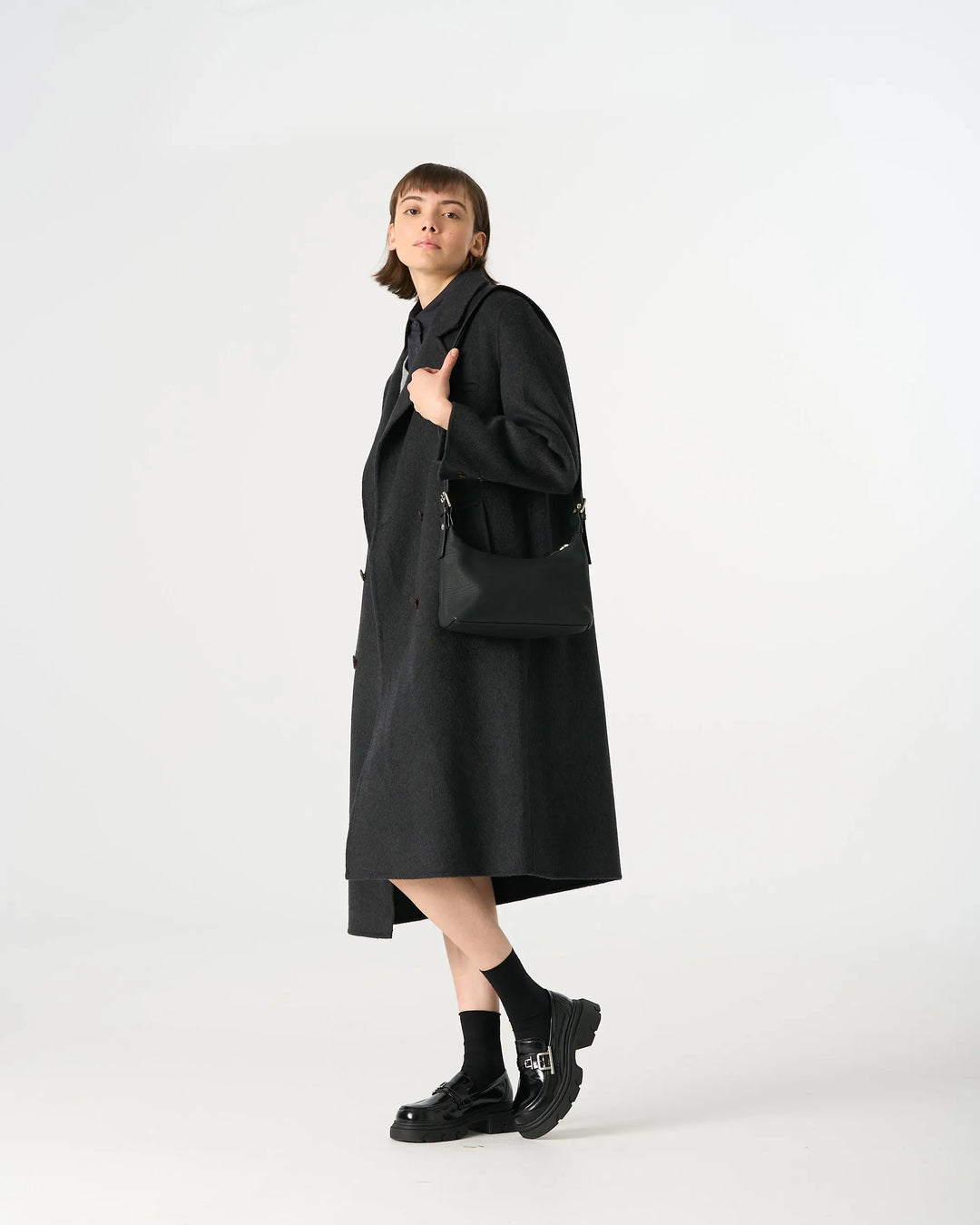 An image of a  Black TF1021 Vegan Leather Shoulder Bag by  Mirra Masa