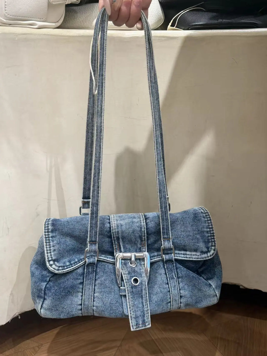 An image of a   TF1765 Buckle Detail Denim Bag by  Mirra Masa