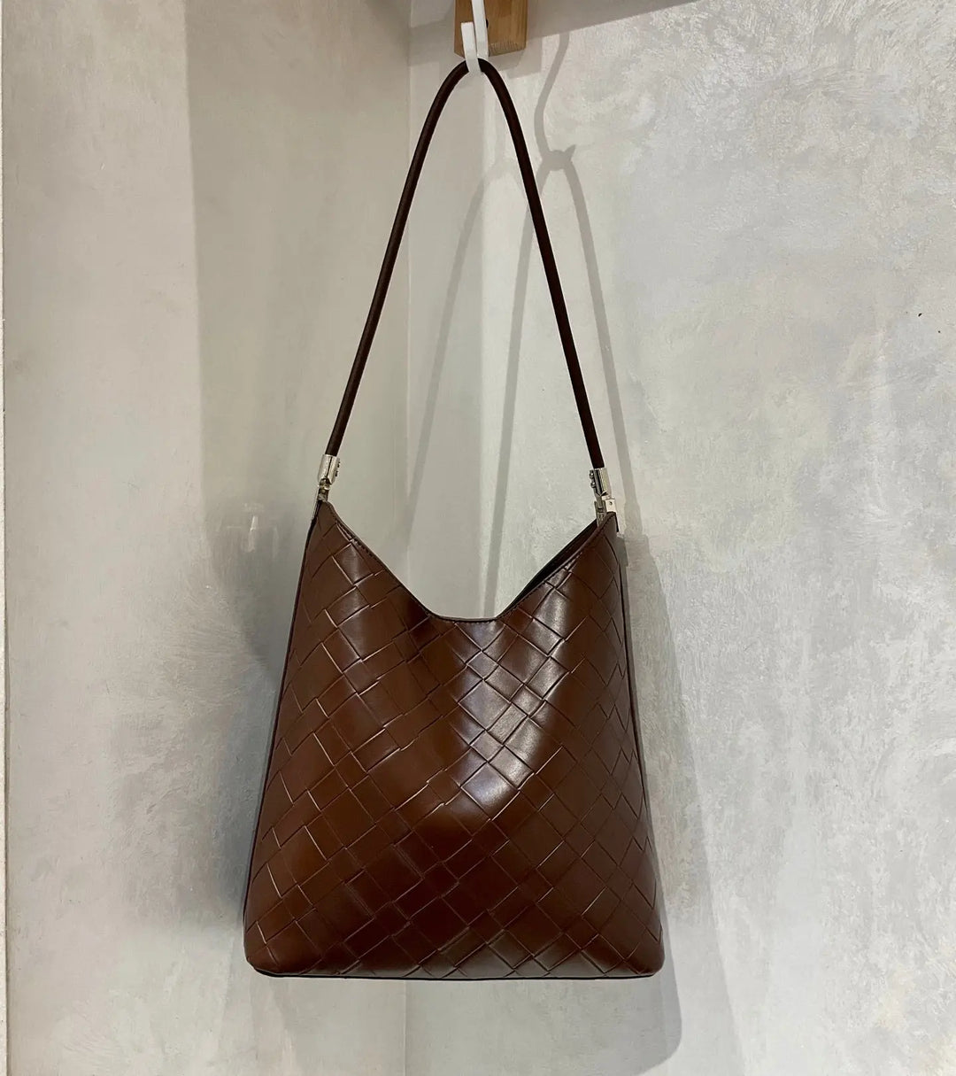An image of a   TF2327 Woven Hobo Bag by  Mirra Masa