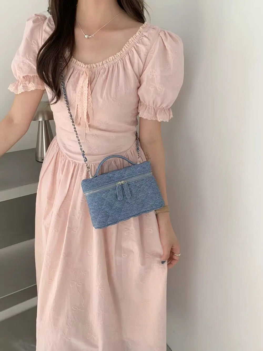 An image of a   TF2729 Denim Crossbody Bag by  Mirra Masa