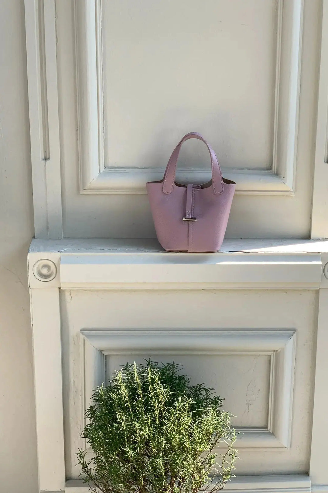 An image of a   TF5318 Structured Mini Tote by  Mirra Masa