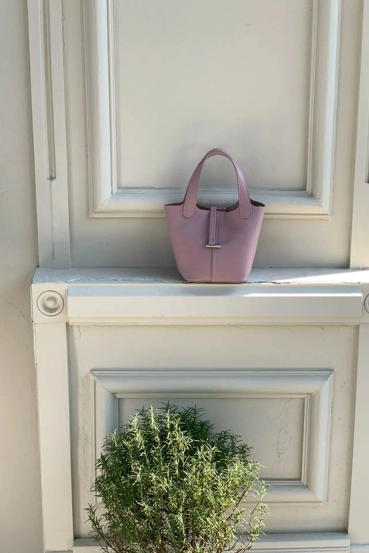 An image of a   TF5318 Structured Mini Tote by  Mirra Masa