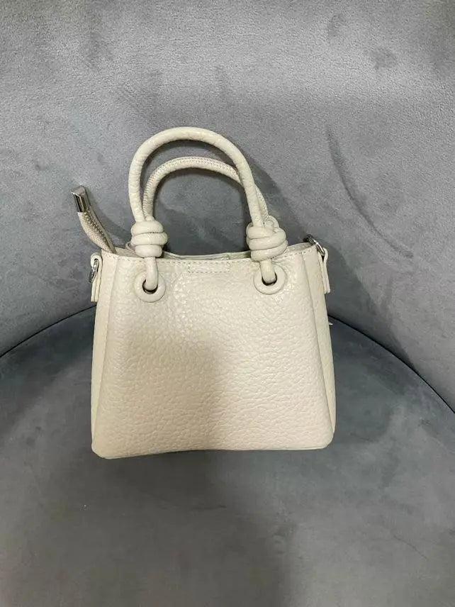 An image of a  Almond TF5809 Mini Handbag by  Mirra Masa