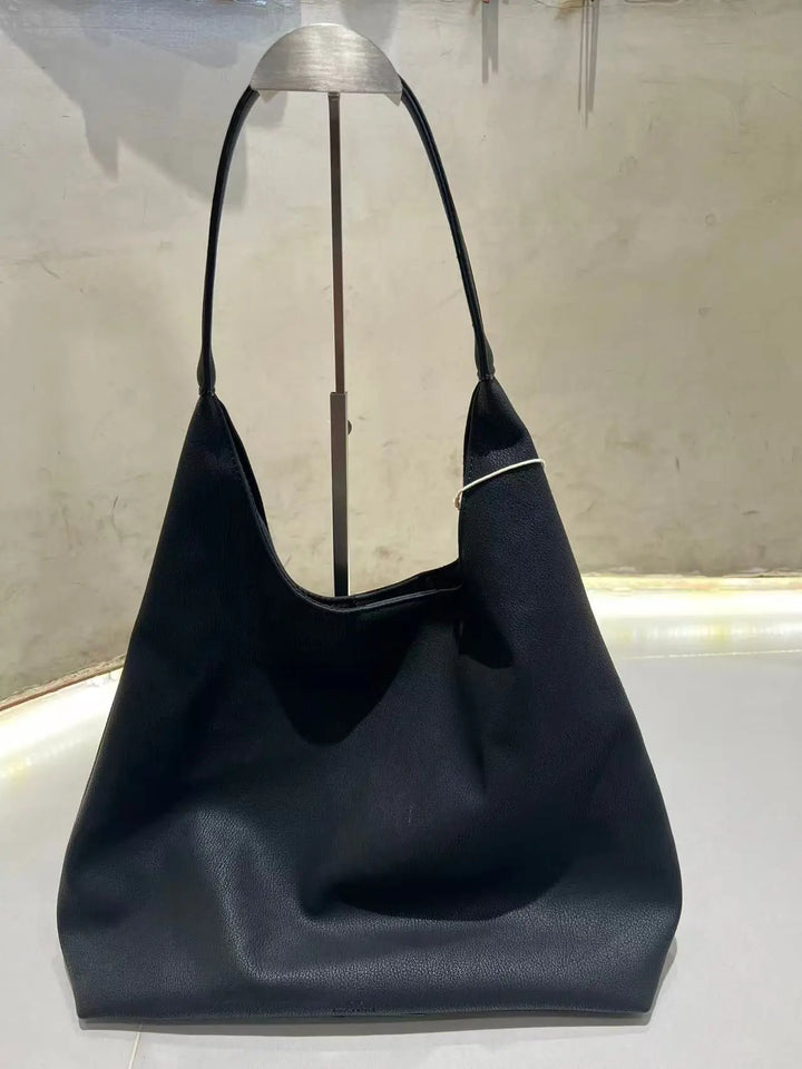 An image of a  Black TF9012 Suede Shoulder Bag by  Mirra Masa