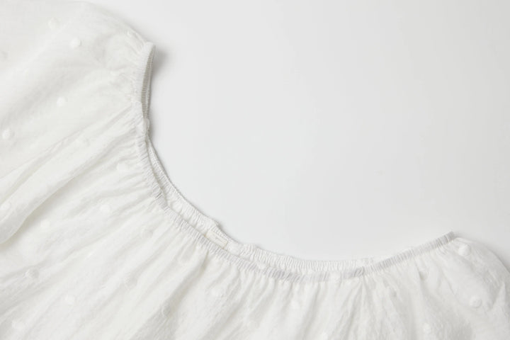 An image of a   TS08QM6 Laced Off-Shoulder Blouse by  Mirra Masa