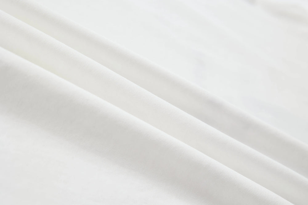 An image of a   TSA79M6 Graphic T-Shirt by  Mirra Masa