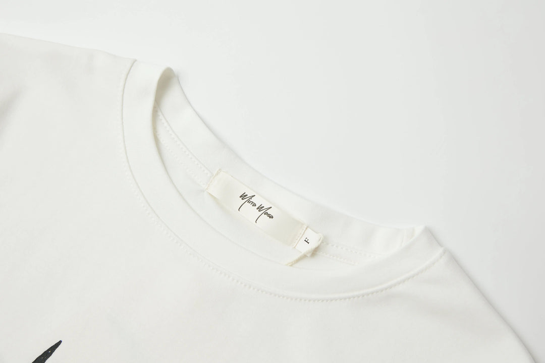 An image of a   TSF96M6 Graphic T-Shirt by  Mirra Masa