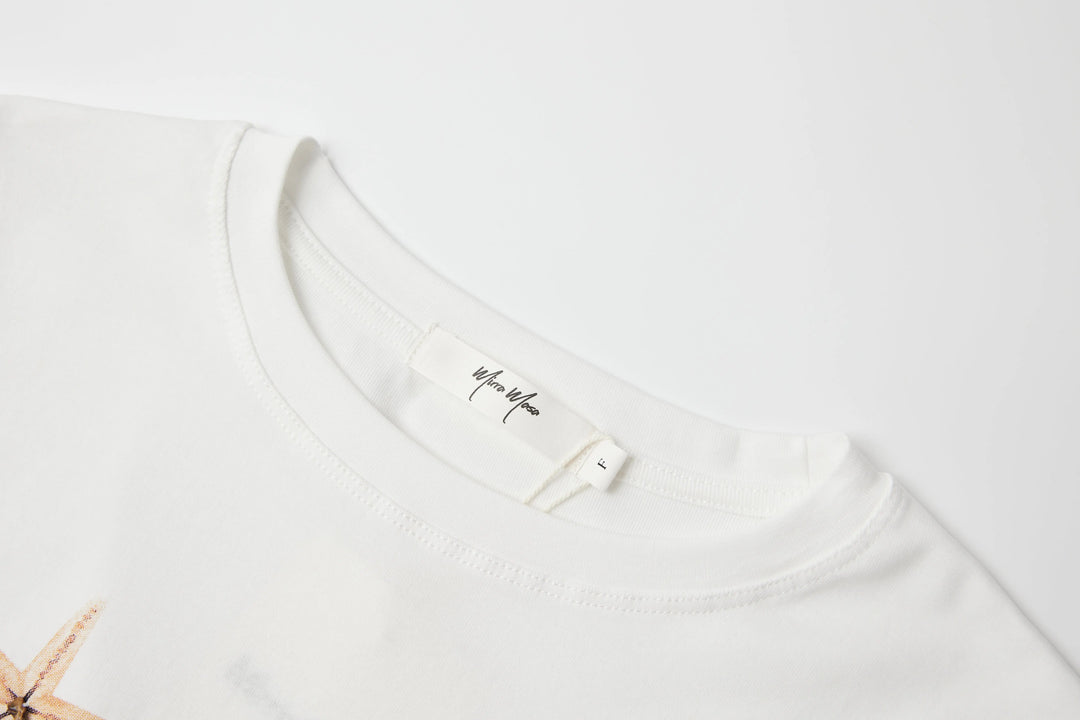An image of a   TSQ91M6 Starfish T-Shirt by  Mirra Masa