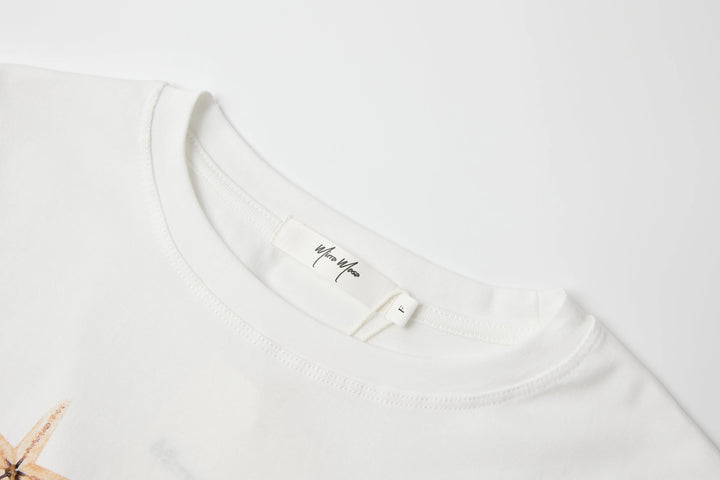 An image of a   TSQ91M6 Starfish T-Shirt by  Mirra Masa