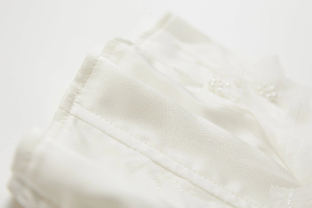 An image of a   TTN22M6 Floral Tube Top by  Mirra Masa