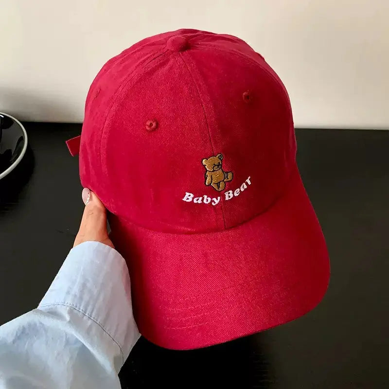 An image of a  Red Teddy Bear Embroidered Baseball Cap by  Mirra Masa