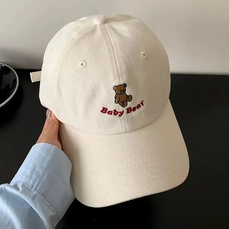 An image of a  Beige Teddy Bear Embroidered Baseball Cap by  Mirra Masa