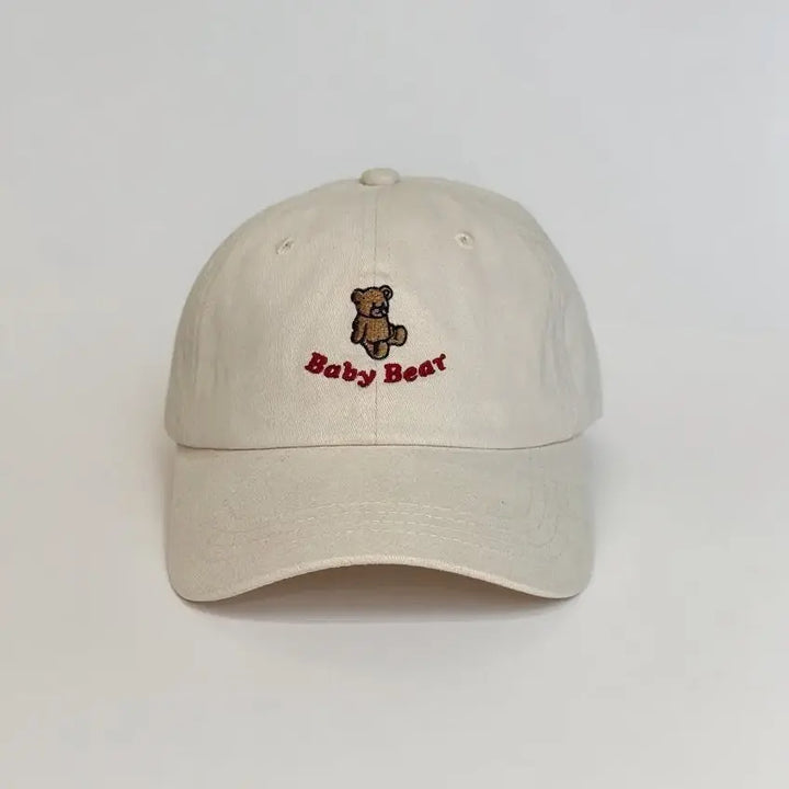 An image of a  Beige Teddy Bear Embroidered Baseball Cap by  Mirra Masa