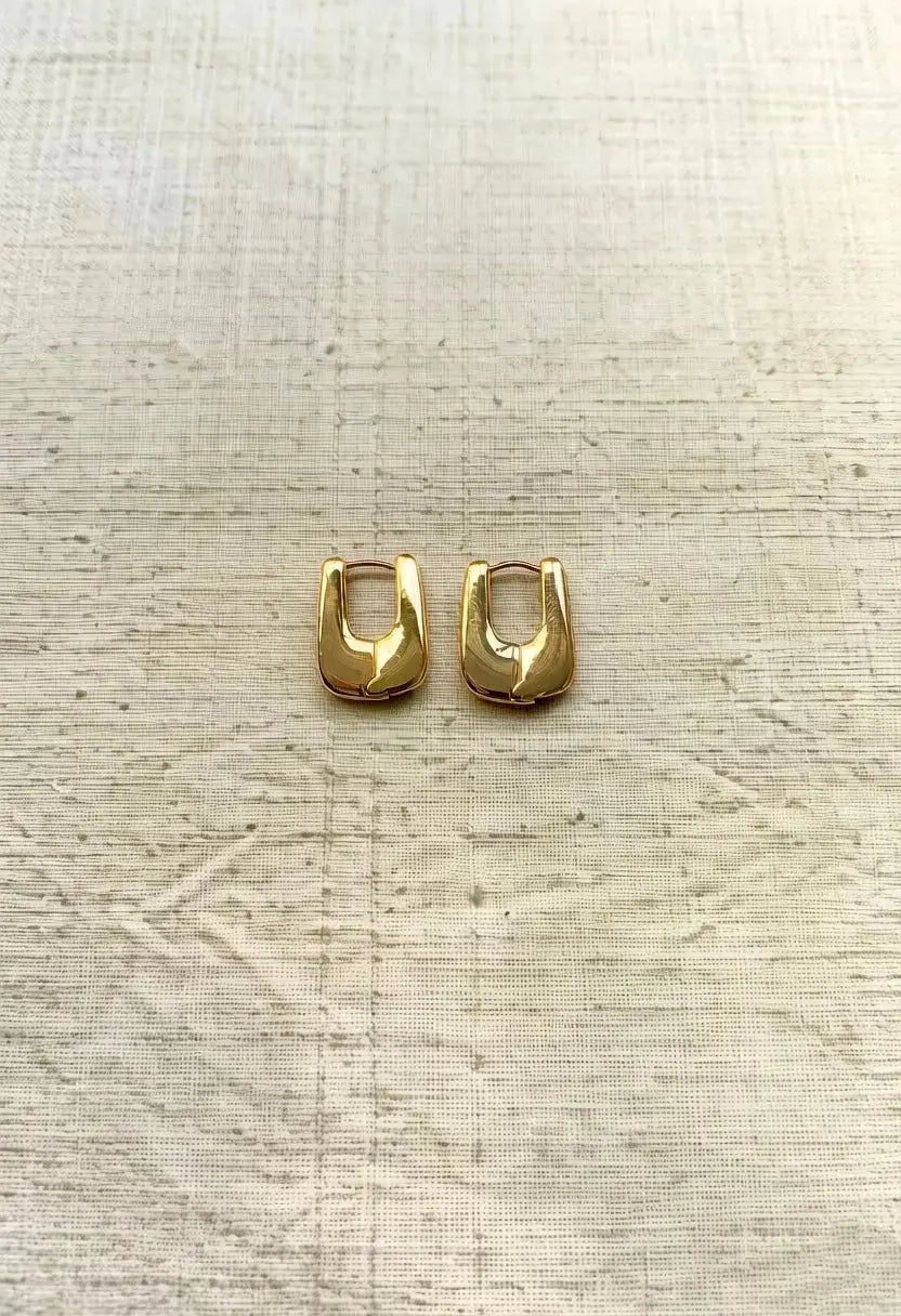 An image of a   The Structural U-Hoop Earrings by  Mirra Masa