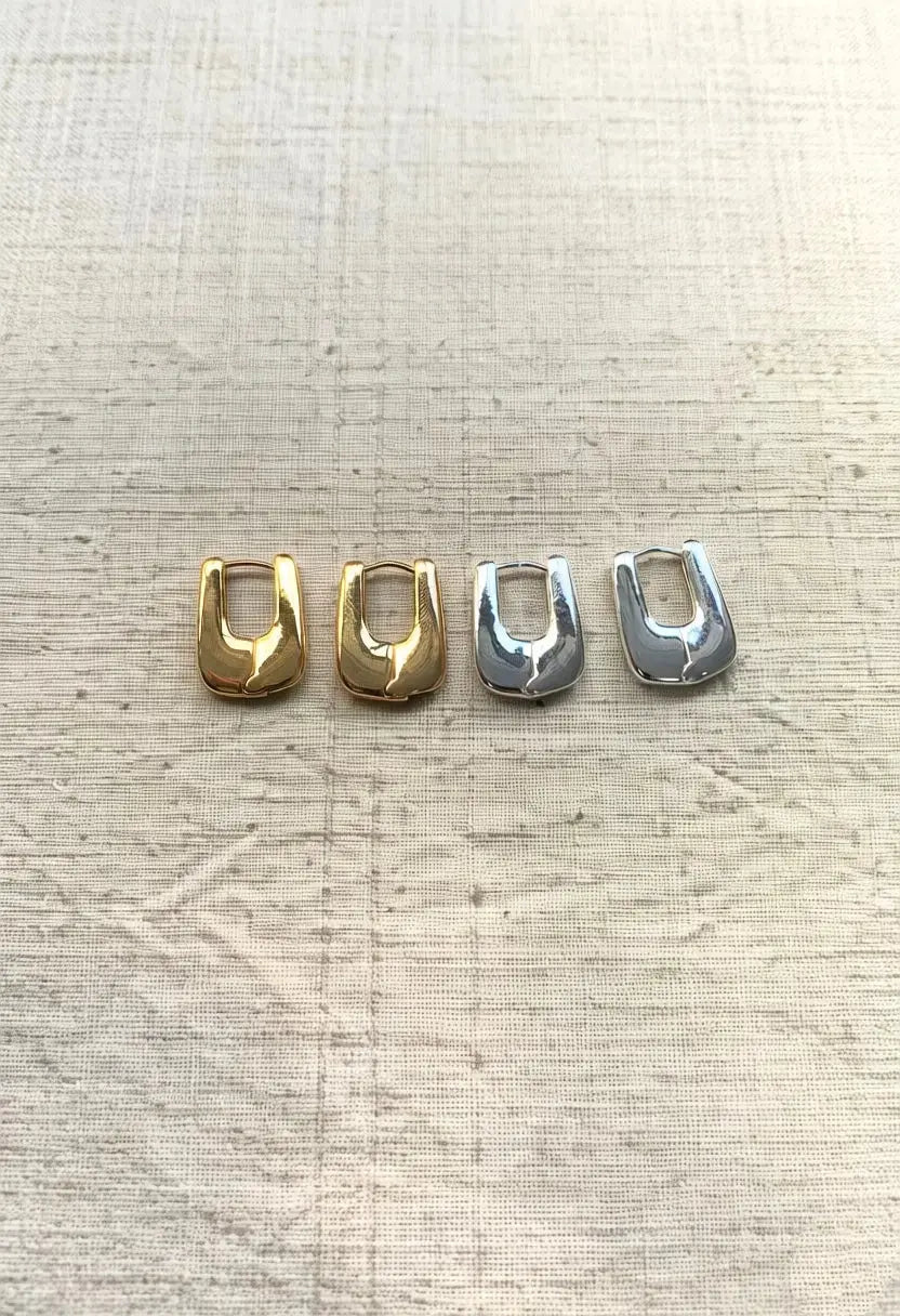 An image of a   The Structural U-Hoop Earrings by  Mirra Masa