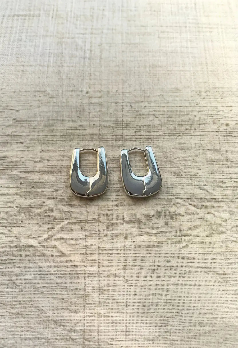 An image of a   The Structural U-Hoop Earrings by  Mirra Masa