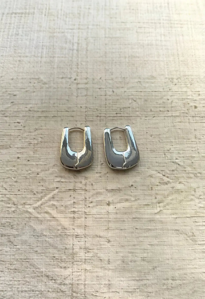 An image of a   The Structural U-Hoop Earrings by  Mirra Masa