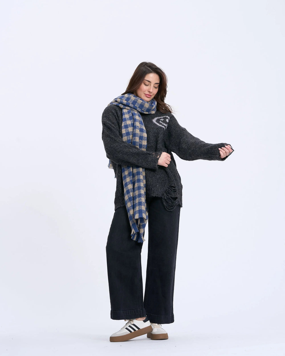 An image of a  Blue Checker WJ28 Essential Checkered Scarf by  Mirra Masa