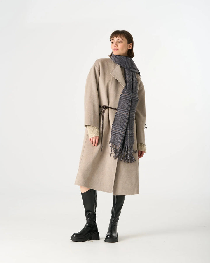 An image of a  Navy Plaid WJ28 Essential Checkered Scarf by  Mirra Masa