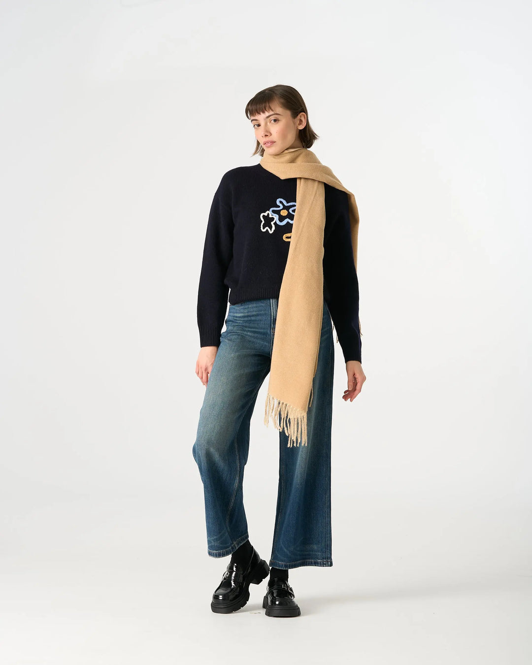 An image of a   WJ28 Essential Checkered Scarf by  Mirra Masa