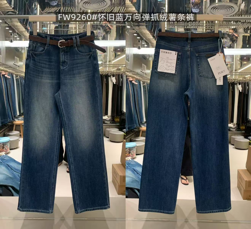 Front and back views of dark blue Heritage Straight-Leg Jeans with faded detailing, five-pocket styling and a brown belt.